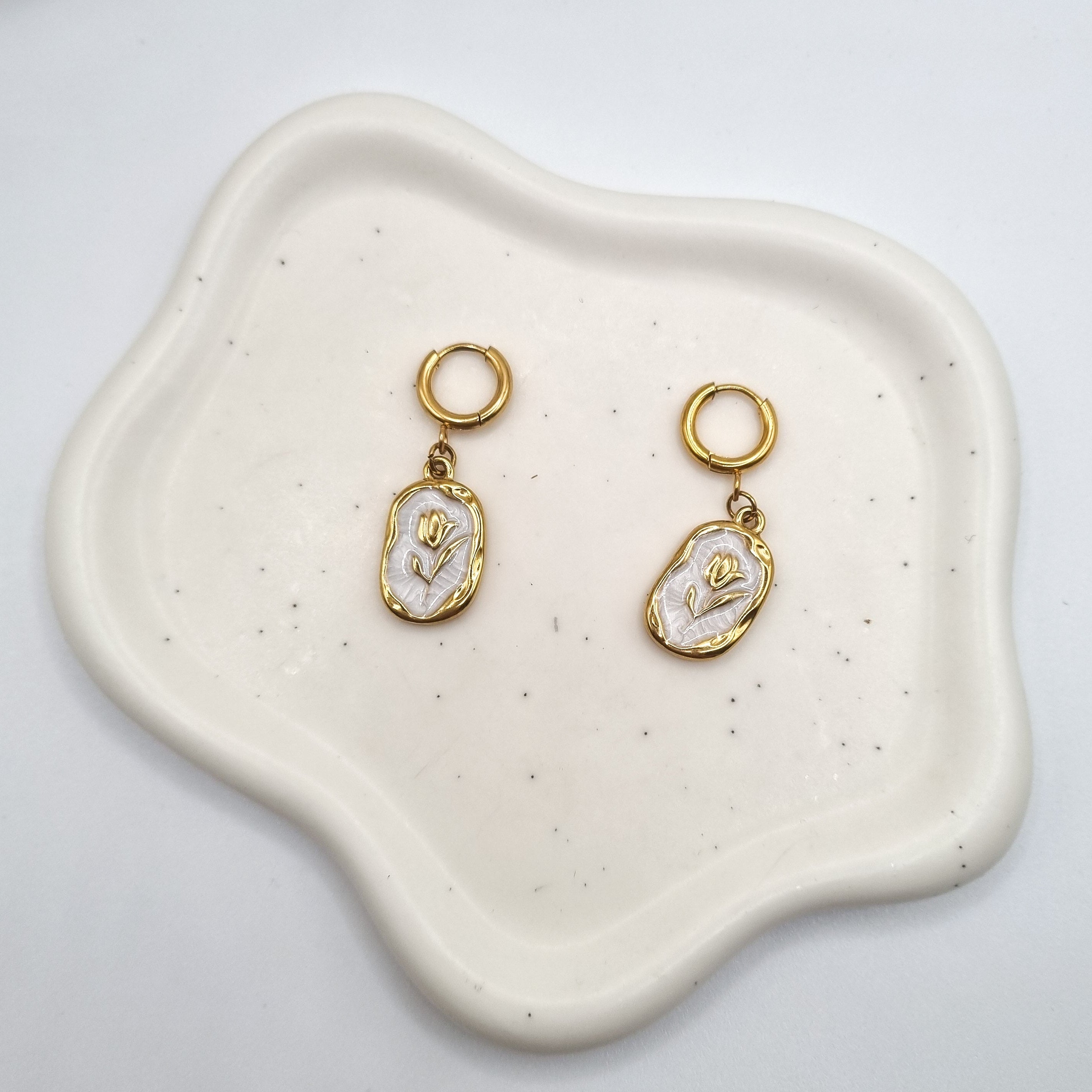 Boucles rose blanche