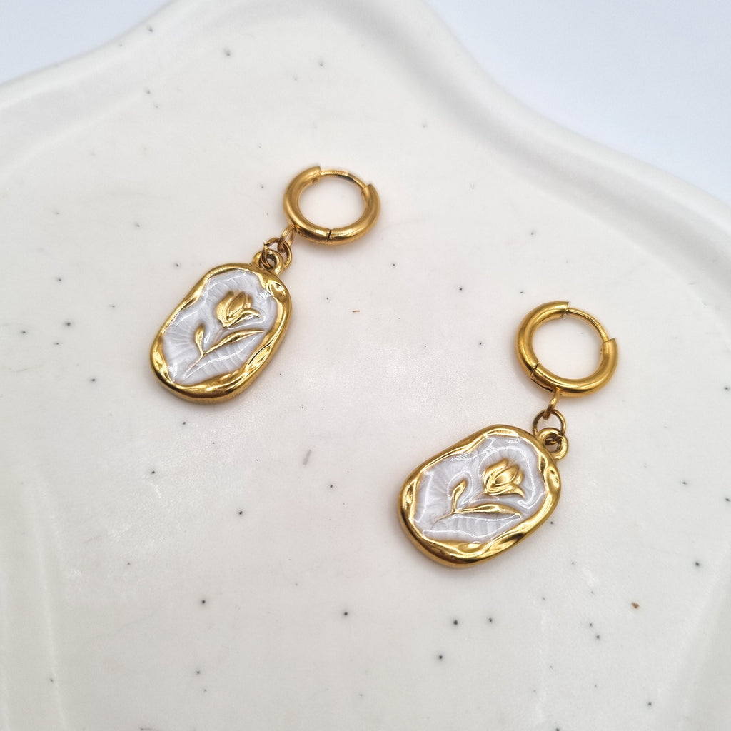 Boucles rose blanche